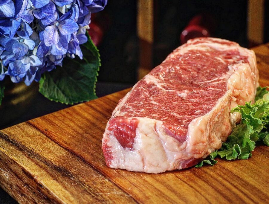 Marbled NY strip ready to cut