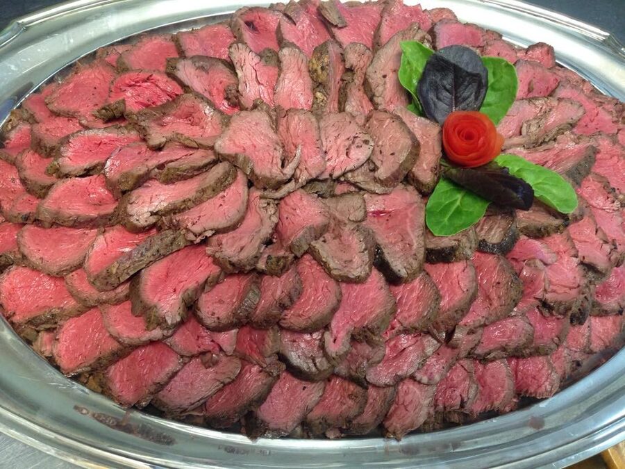 Sliced beef tenderloin catering tray